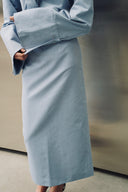 ENESA The Kendall Midi Skirt faded blue front view on model